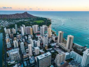 Aerial view of Waikiki Beach Honolulu with Diamond Head at sunset things to do guide — photo by @spensersembrat on Unsplash
